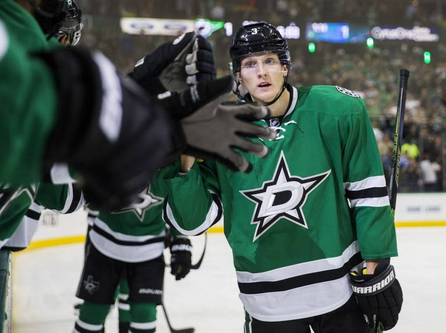 John Klingberg With Teammates Background