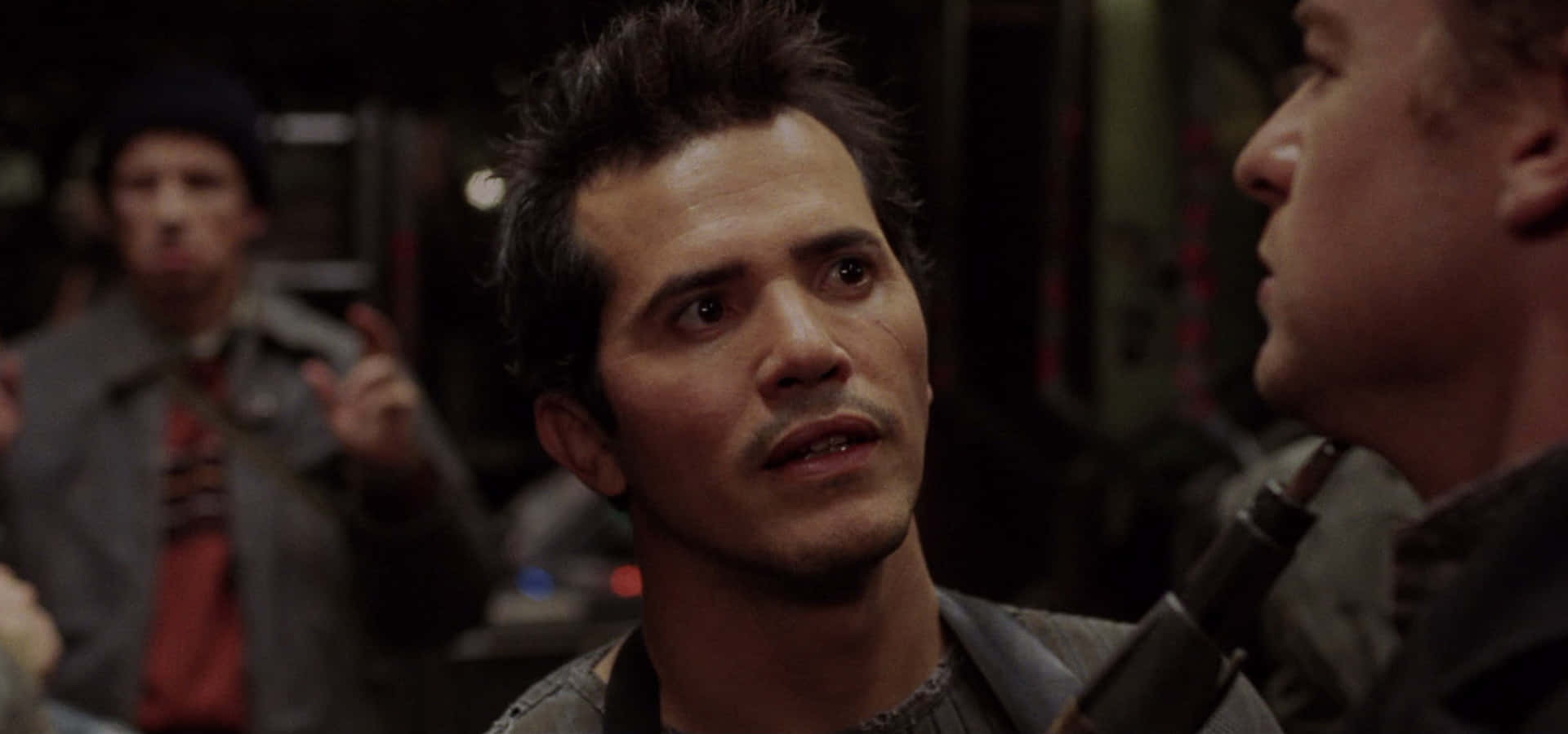 John Leguizamo In Spotlight Background