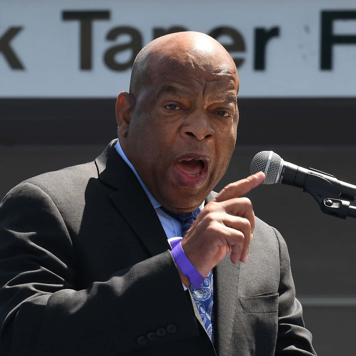 John Lewis Speaking At A Rally Background