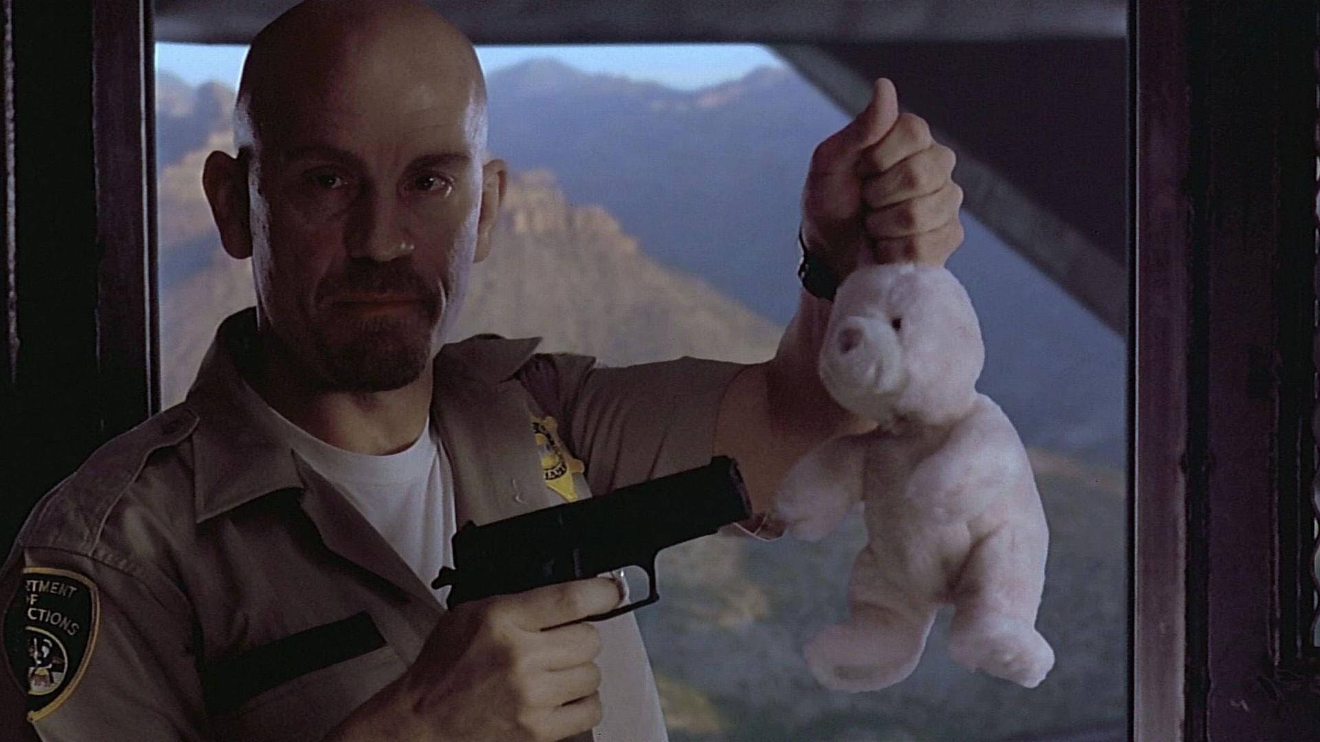 John Malkovich Cyrus 'the Virus' Grissom Background