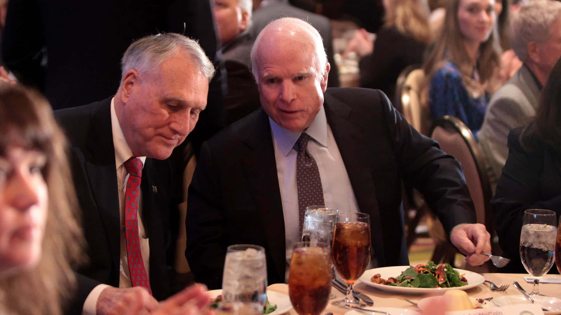 John Mccain Whispering To Jon Kyl Background