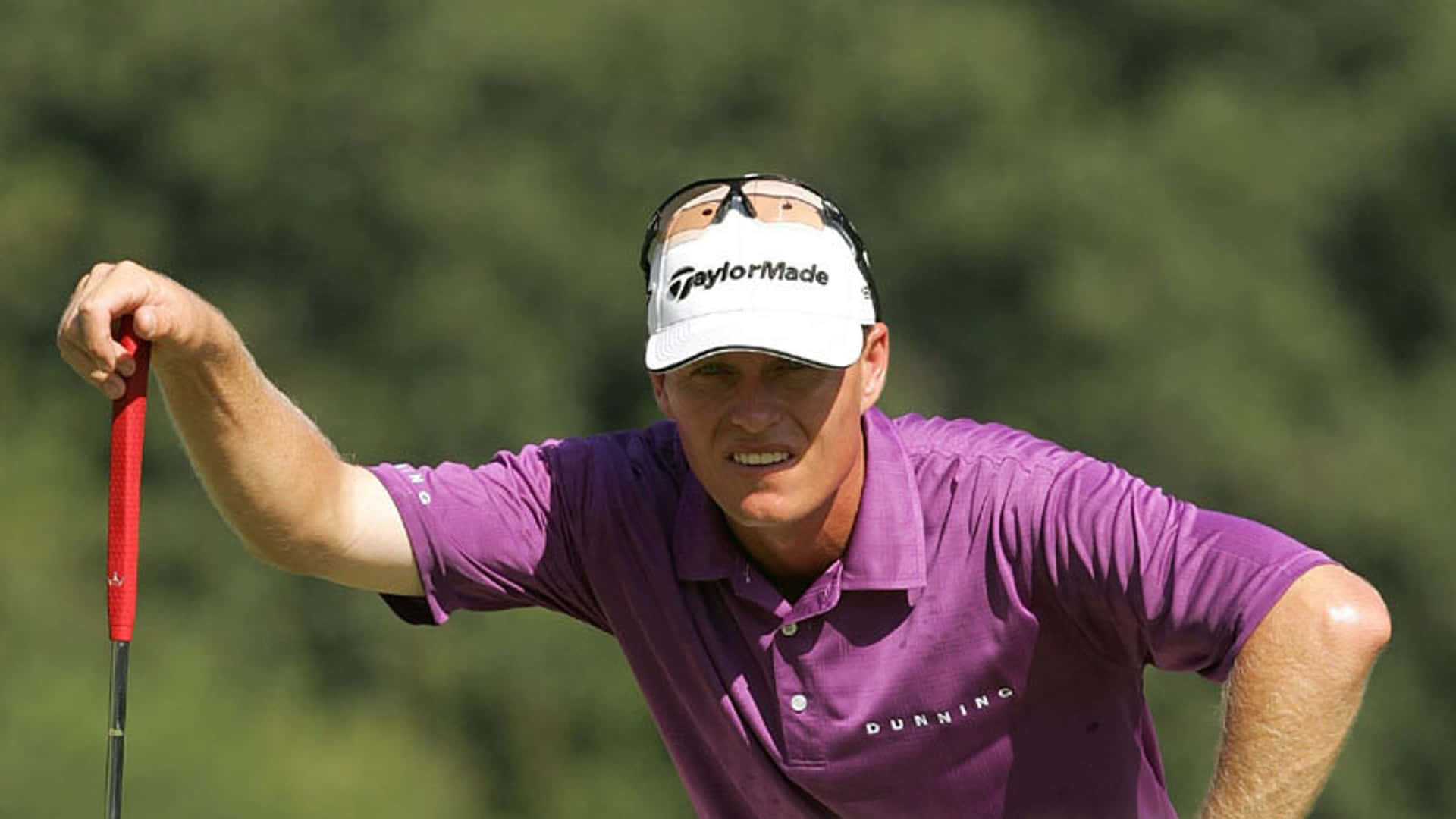 John Senden Checking Golf Course Background