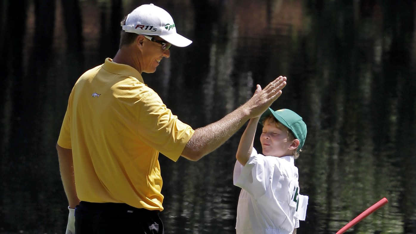 John Senden High-five With Son Background