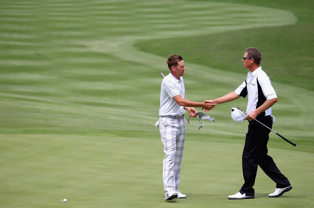 John Senden Shaking Hands On Course Background