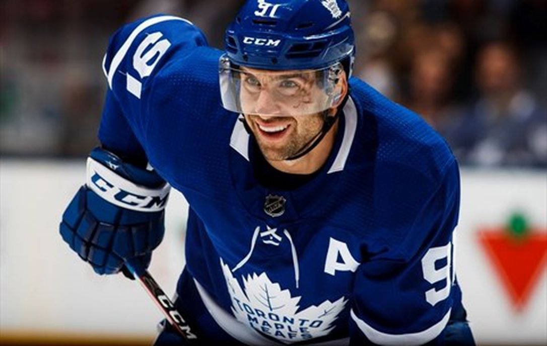 John Tavares Smiling Toronto Maple Leafs Background