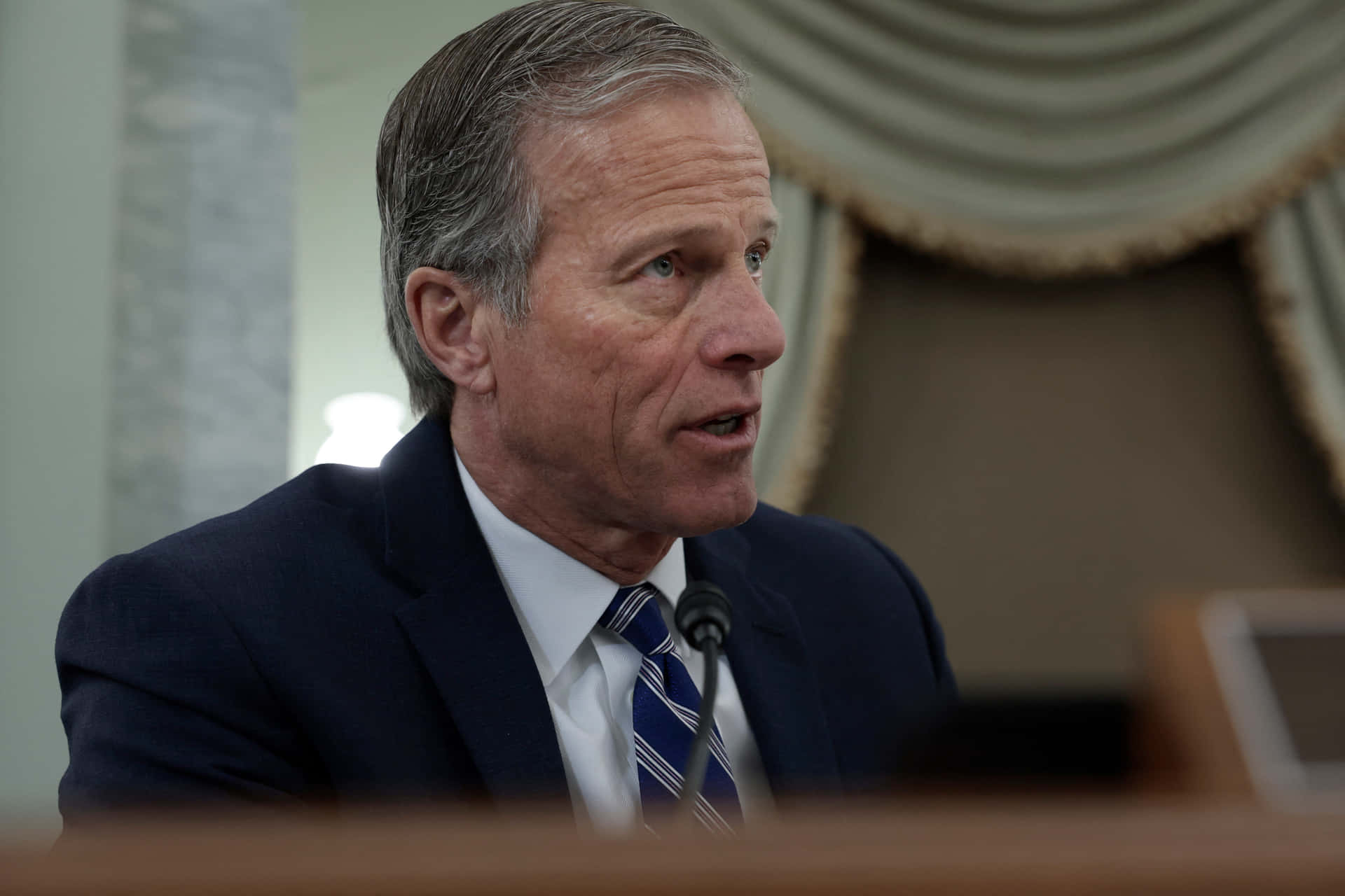 John Thune Striped Blue Tie Background