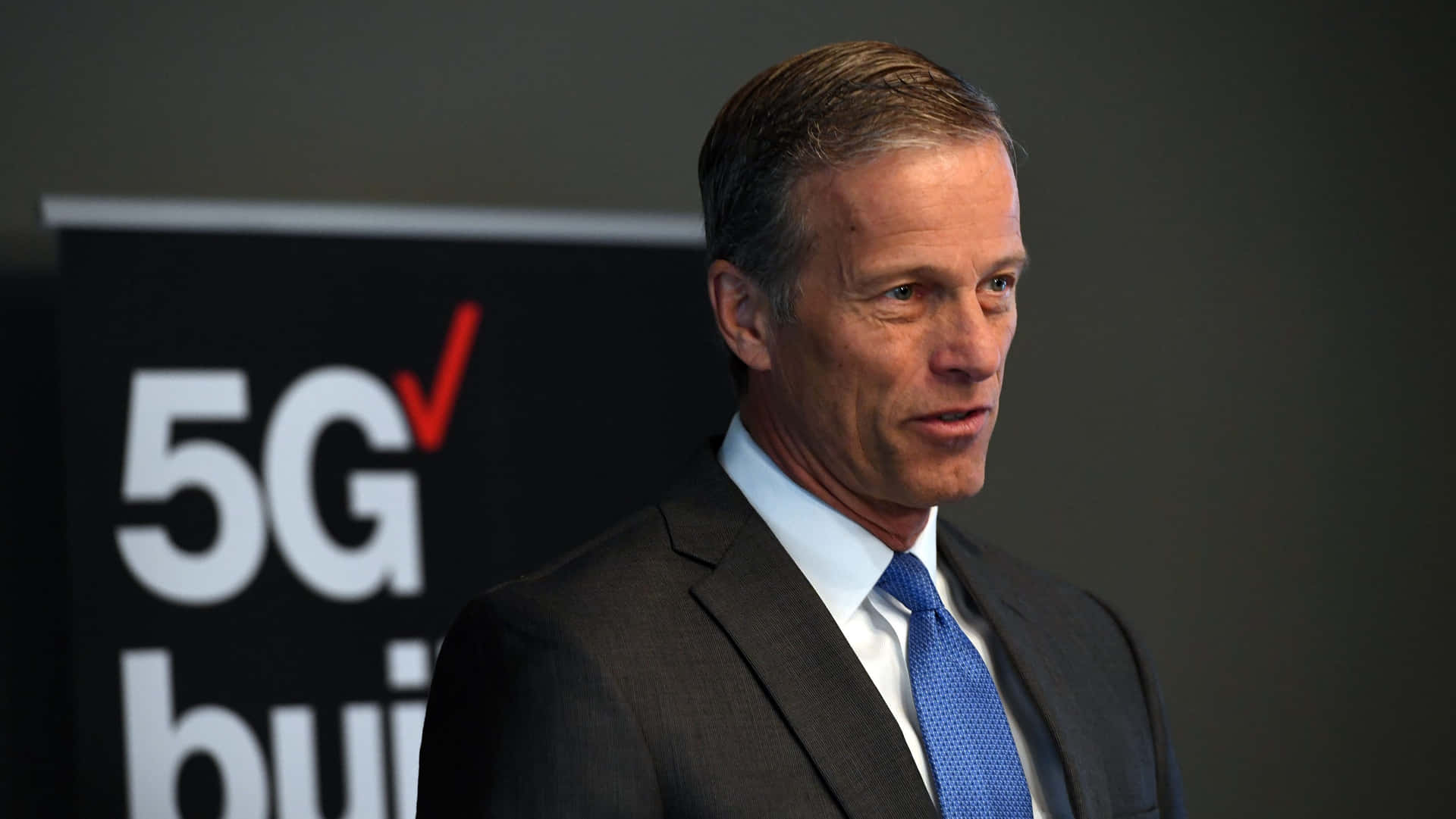 John Thune With Blue Tie Background
