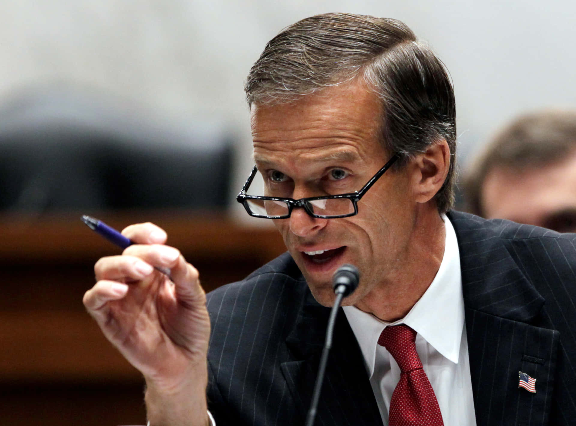 John Thune With Glasses Up Close Background
