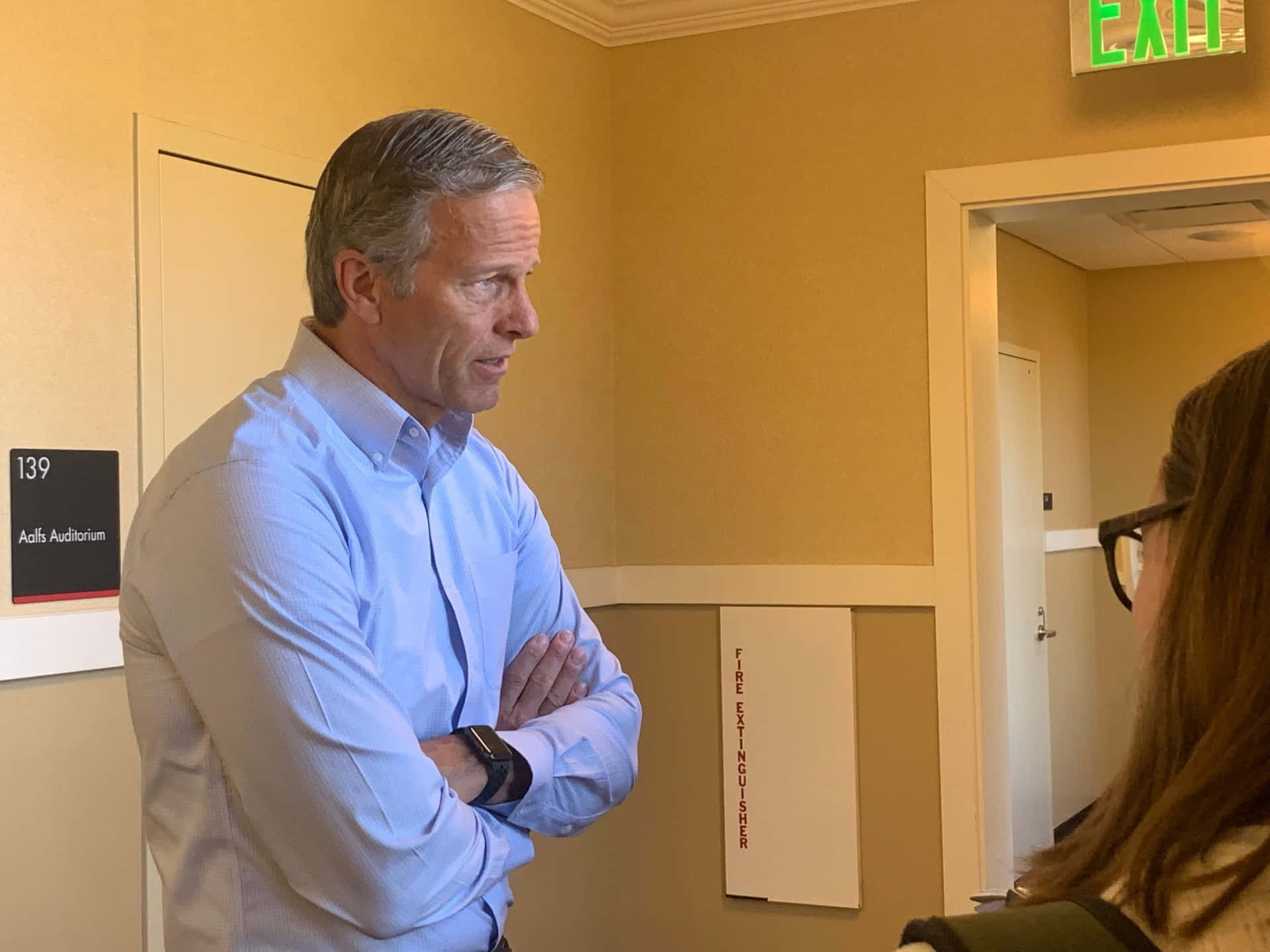 John Thune With His Arms Crossed Background