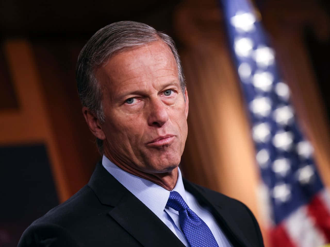 John Thune With Serious Facial Expression Background