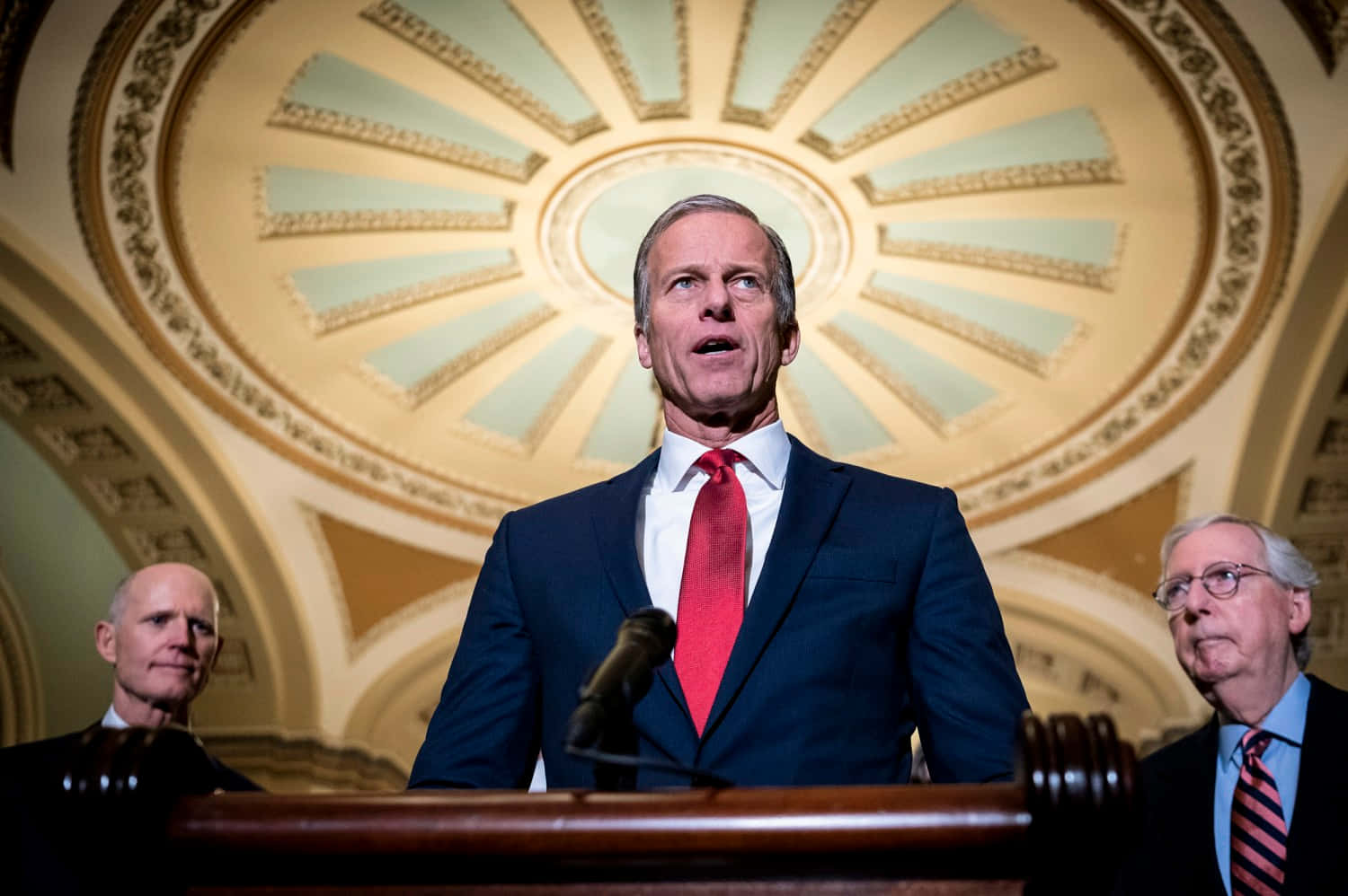 John Thune With Two Men Background