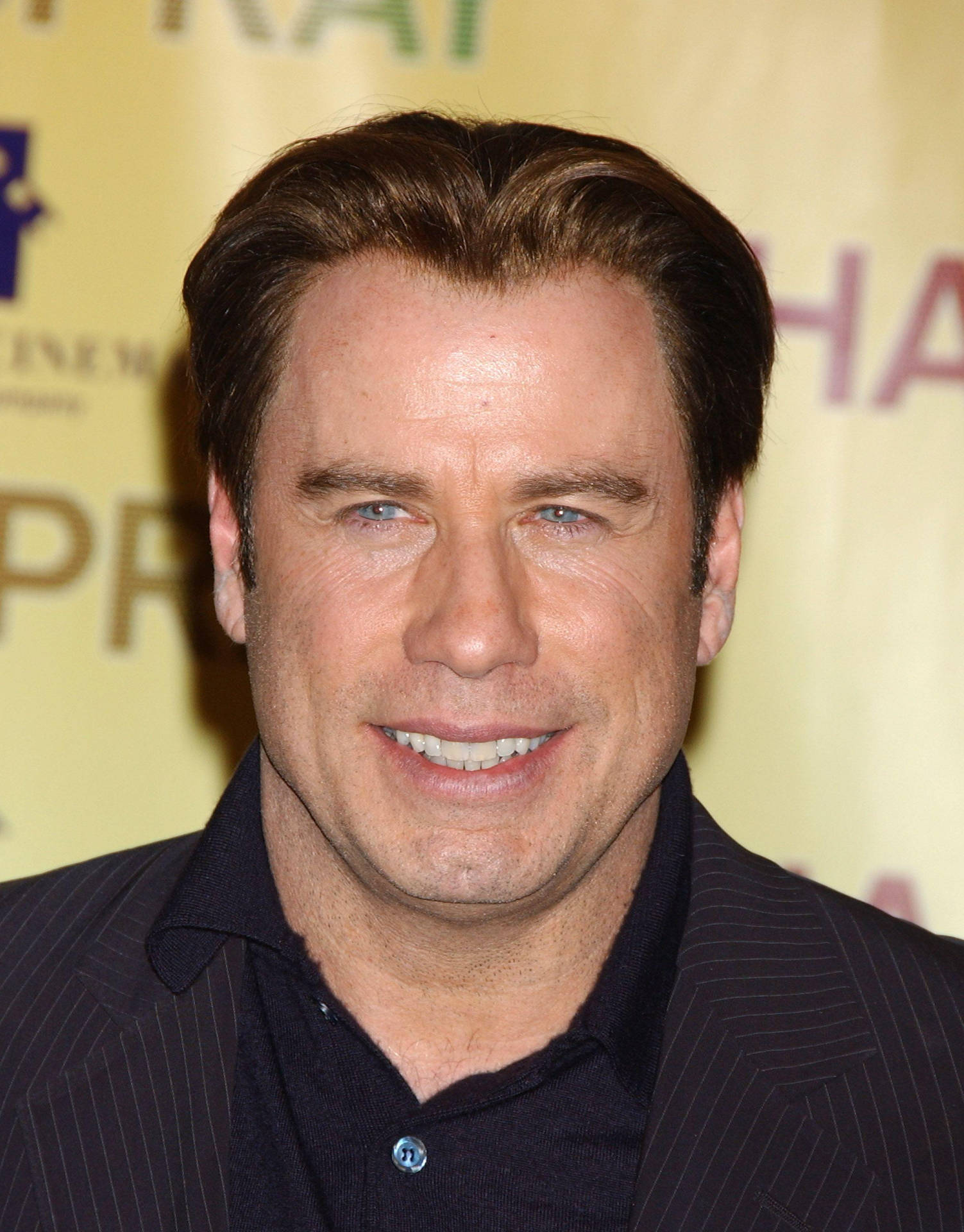 John Travolta Attending Awards Show Background