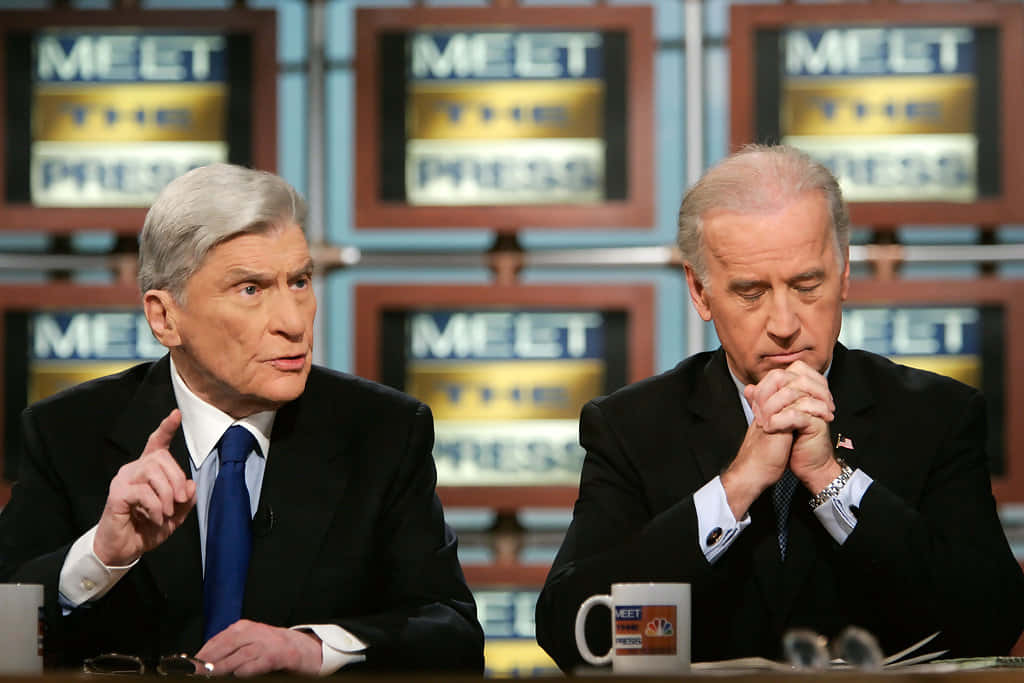 John Warner And Joe Biden On The News Background