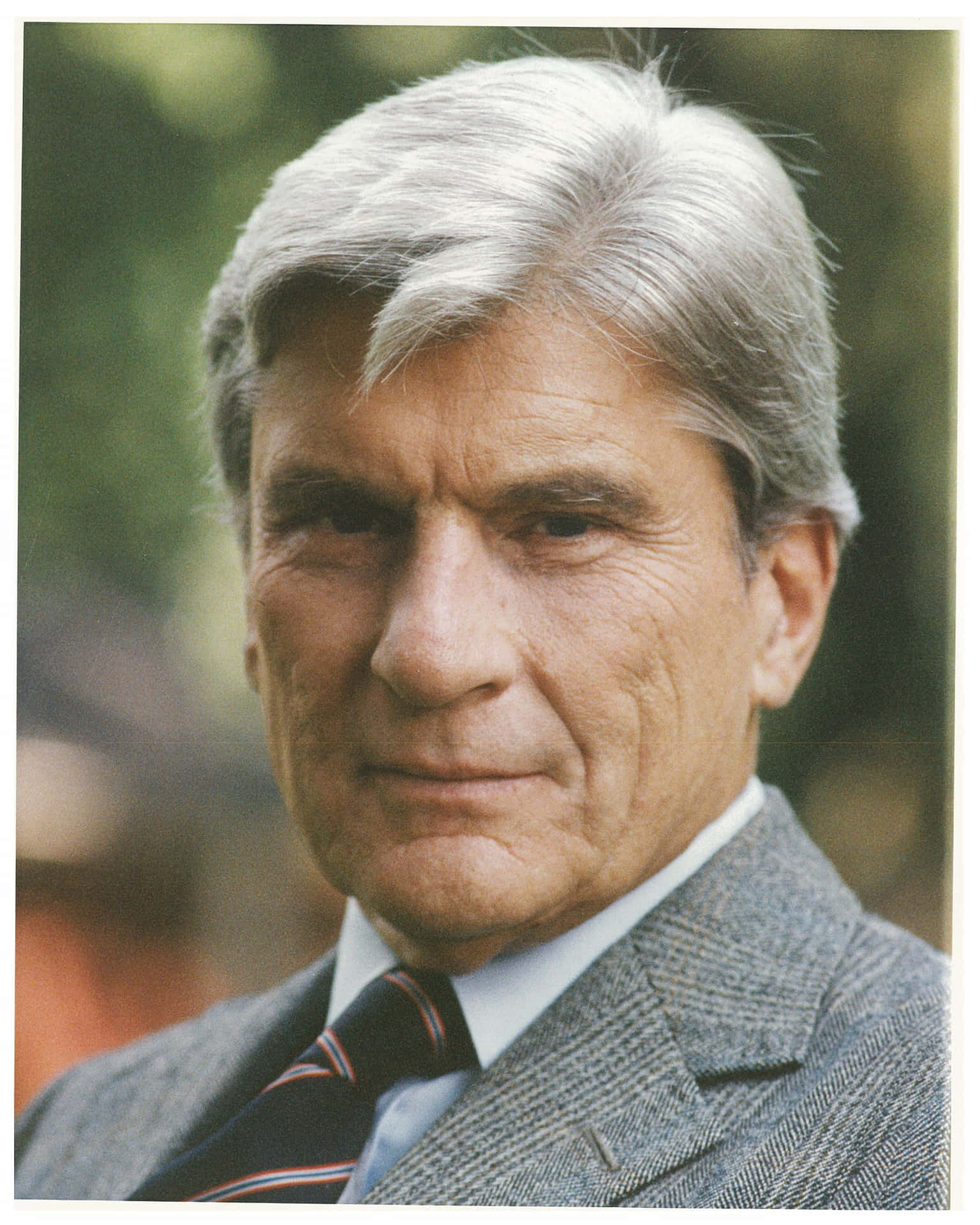 John Warner In A Gray Suit Phone