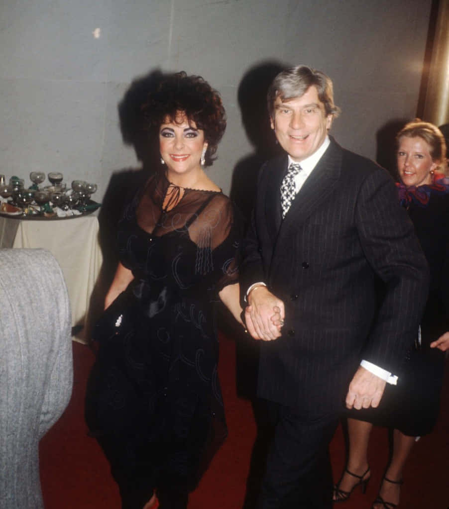John Warner Smiling With Elizabethtaylor