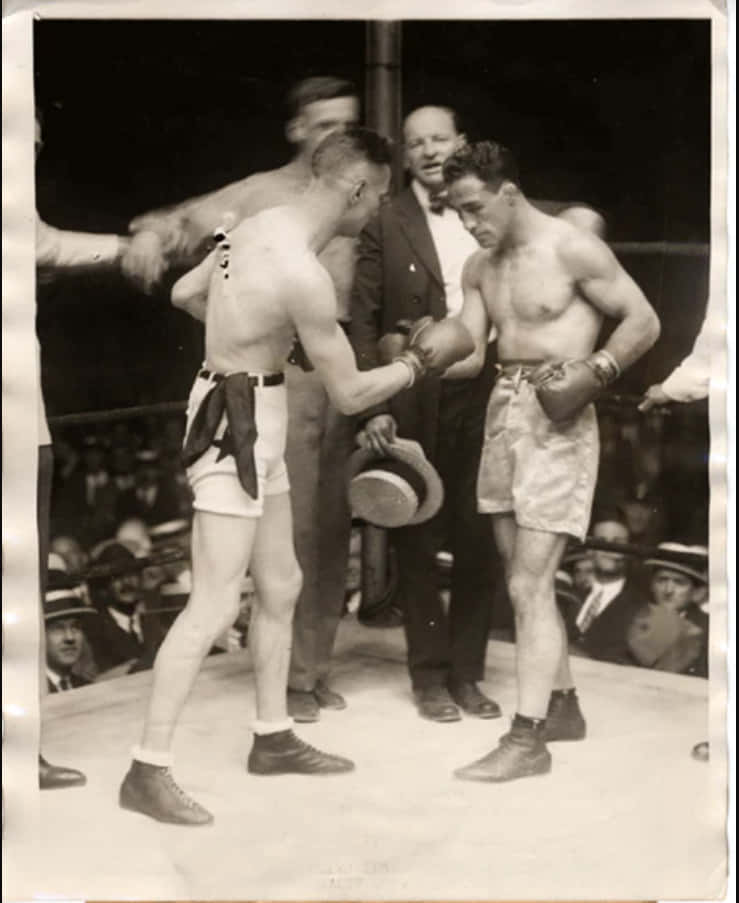 Johnny Dundee And Eugene Criqui's Fist Bump Before The Fight Background