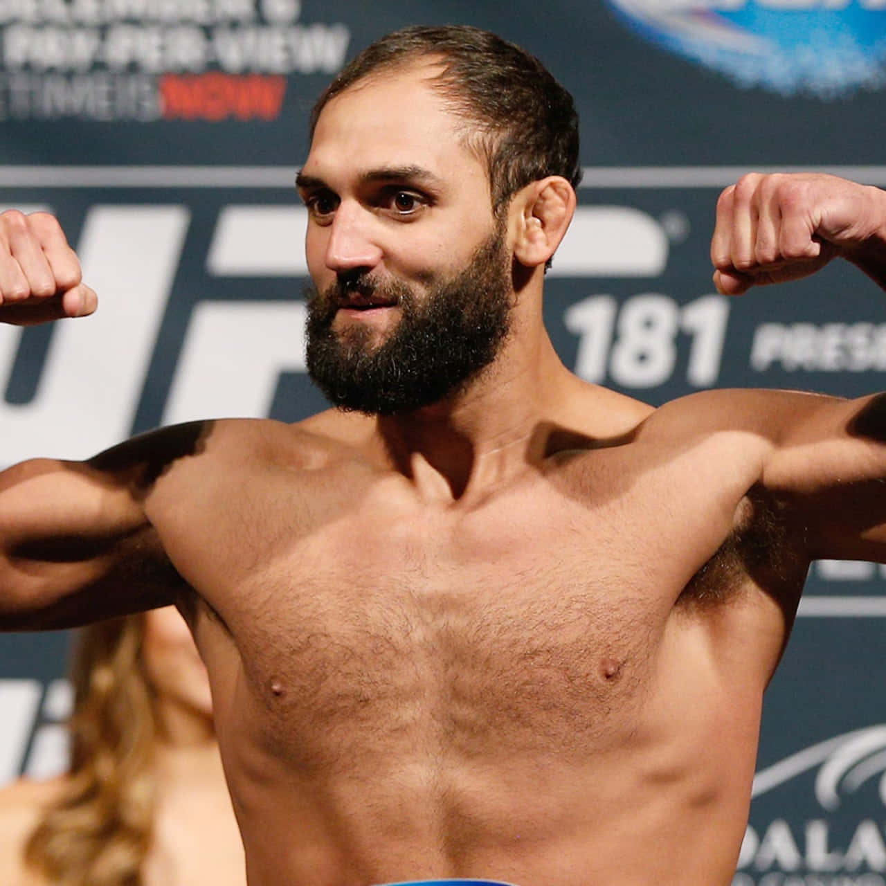 Johny Hendricks Flexing Muscles Background