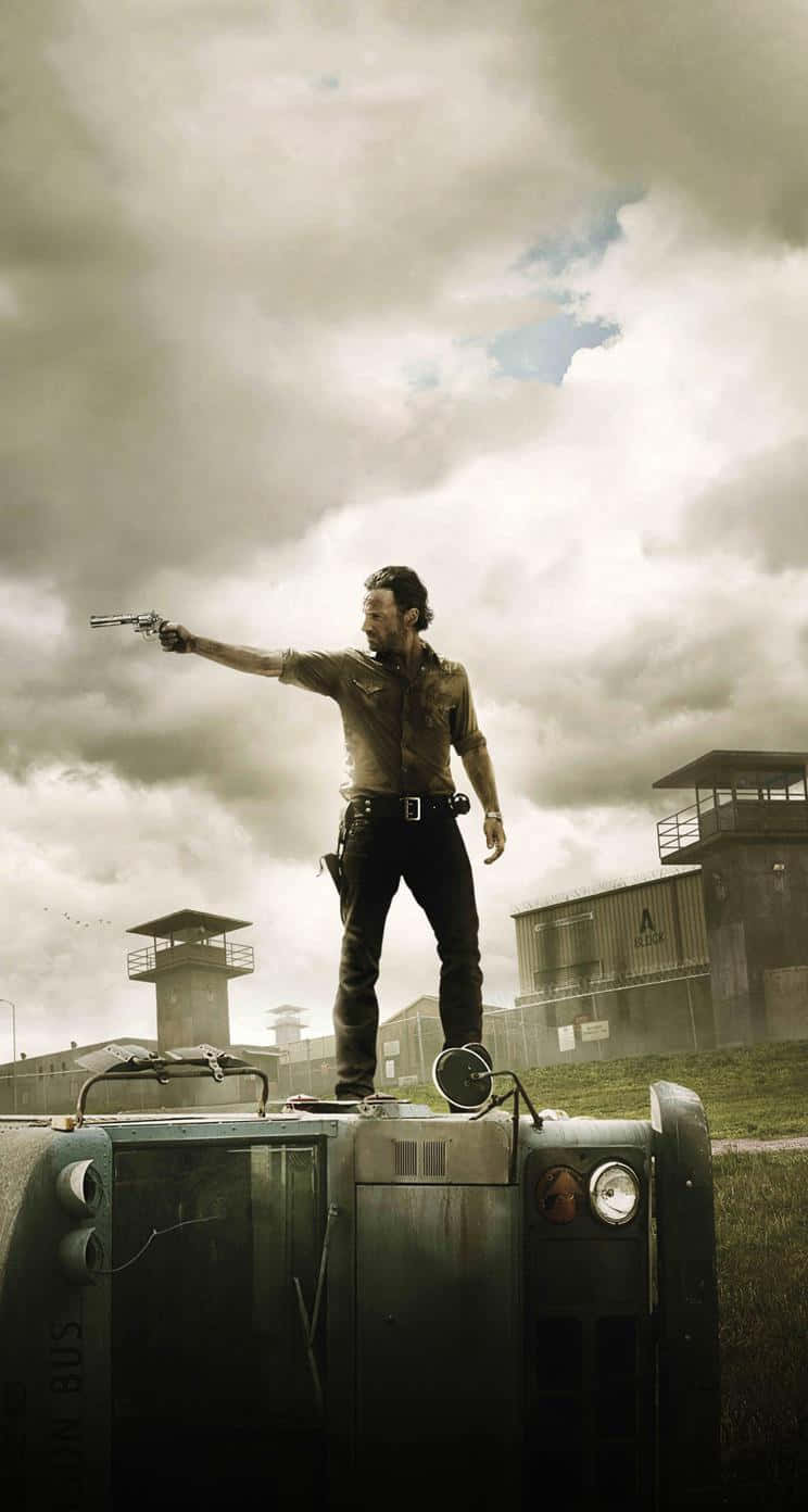 Join The Battle To Survive In The Walking Dead With This Iphone Wallpaper Background