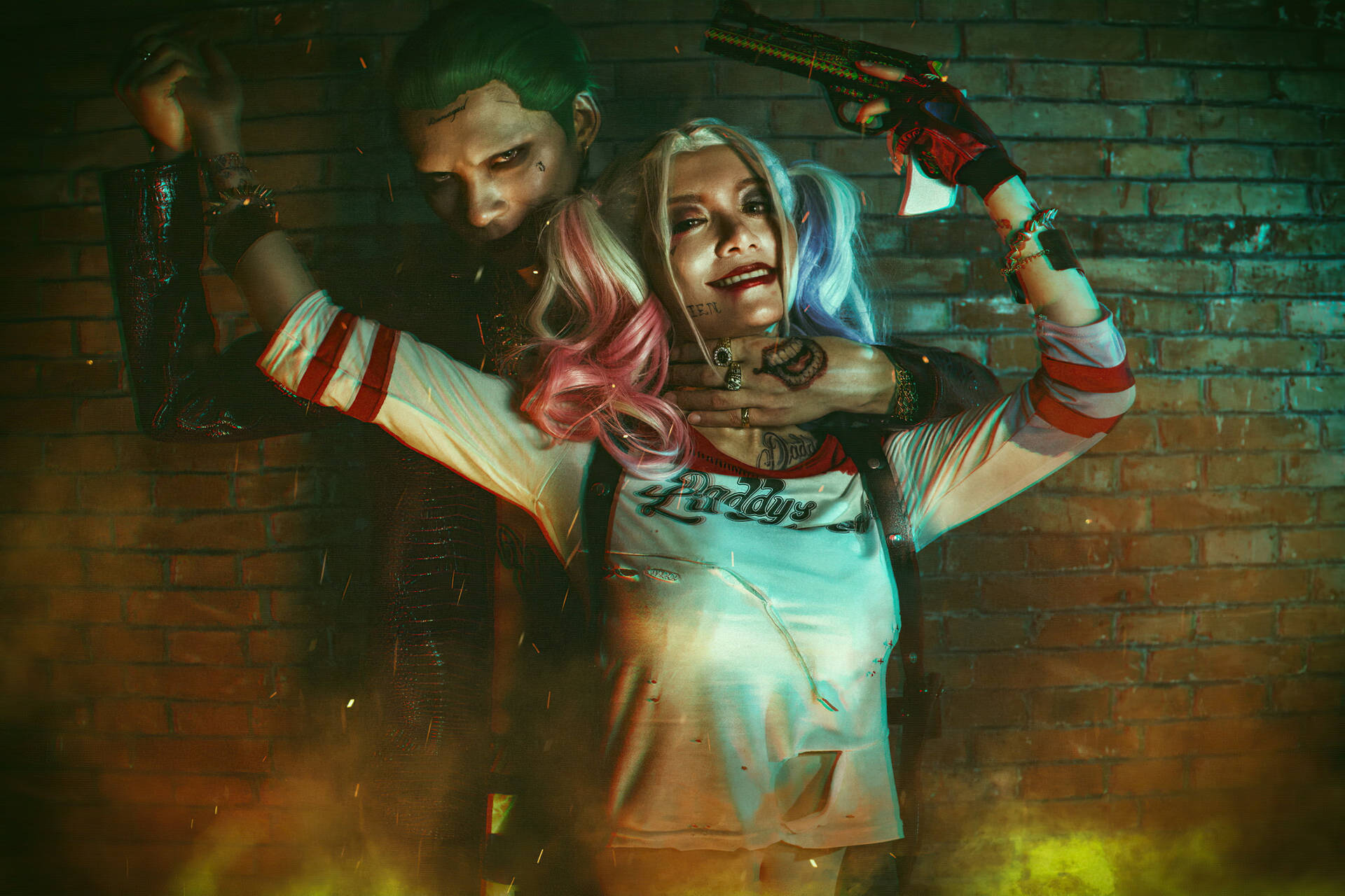 Joker And Harley Quinn Fiery Cosplay Background