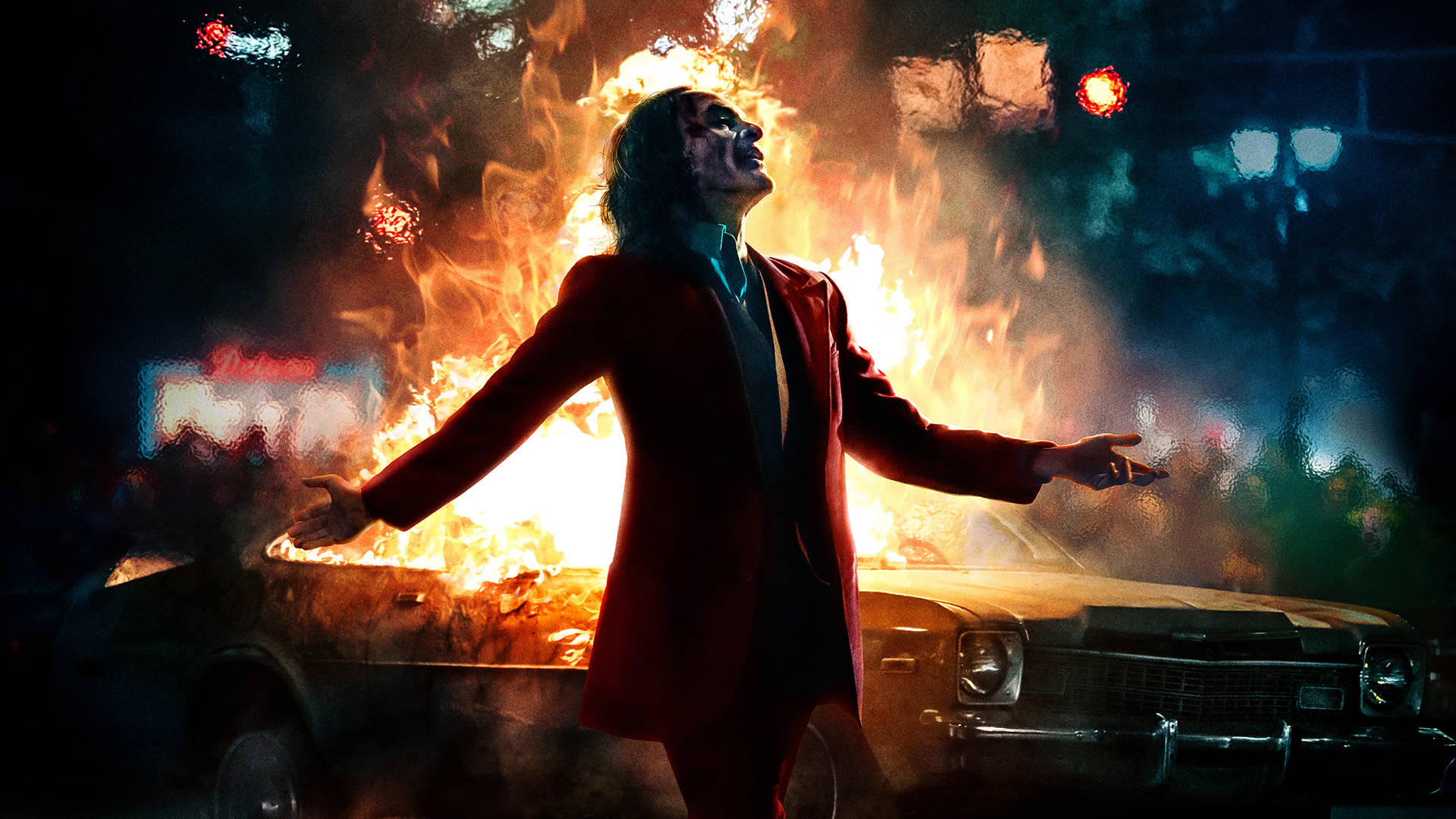 Joker With Car On Fire Background