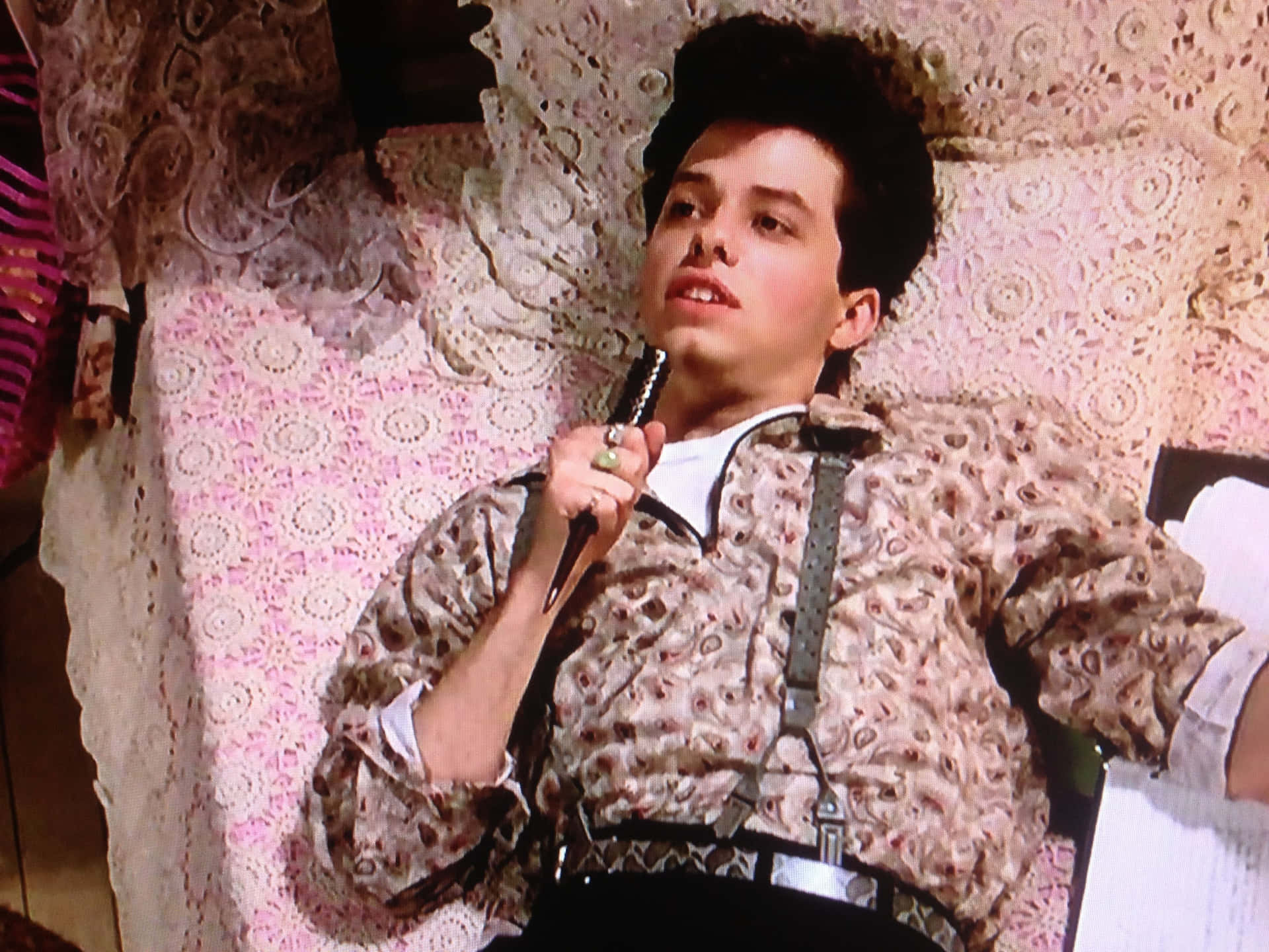 Jon Cryer, The Emmy-winning Actor, Smiles Warmly In A Studio Background