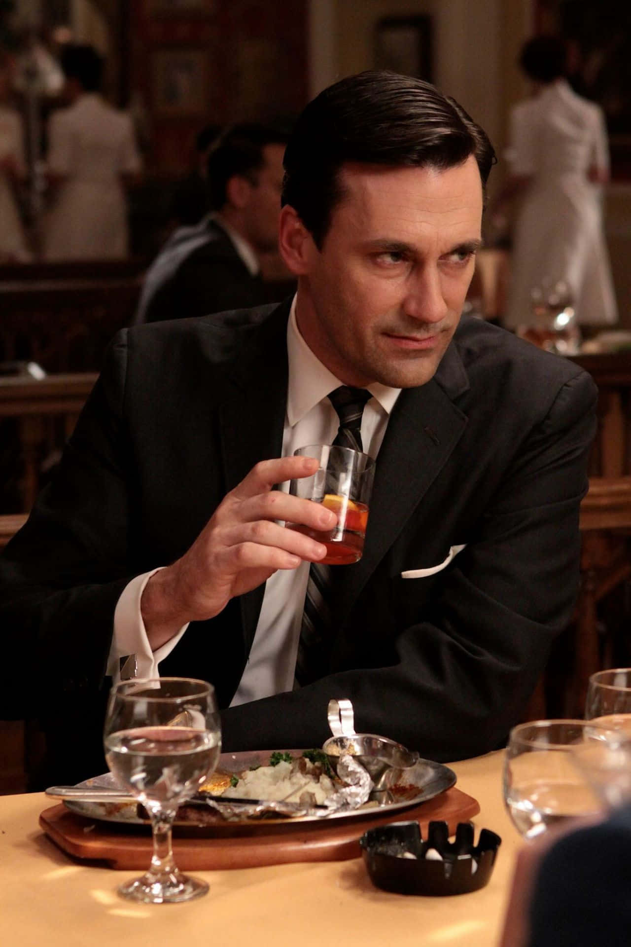 Jon Hamm In Sharp Attire Background