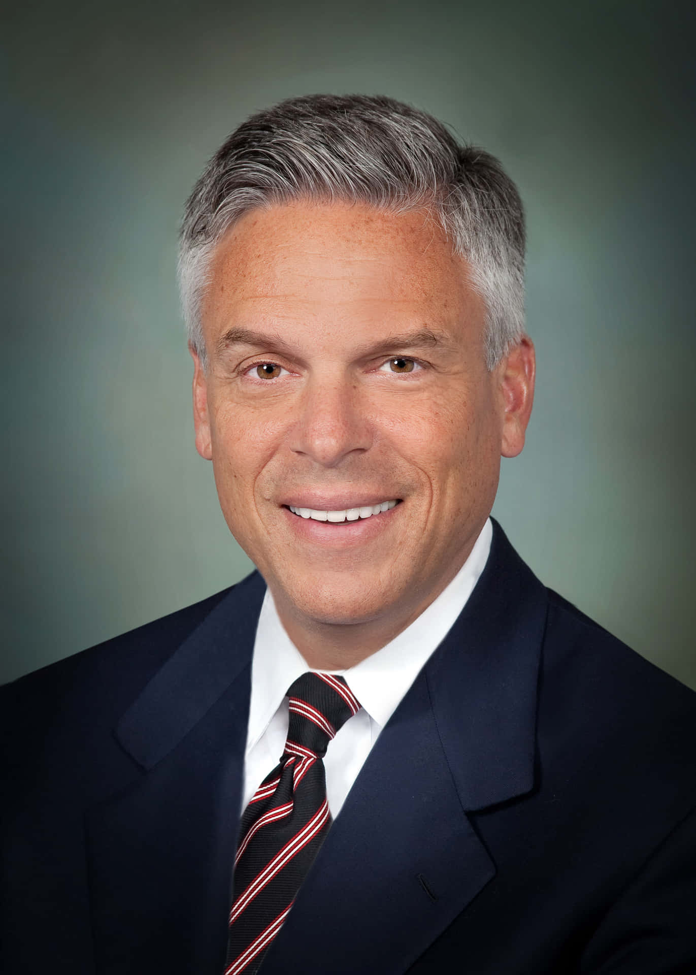 Jon Huntsman In Suit Background