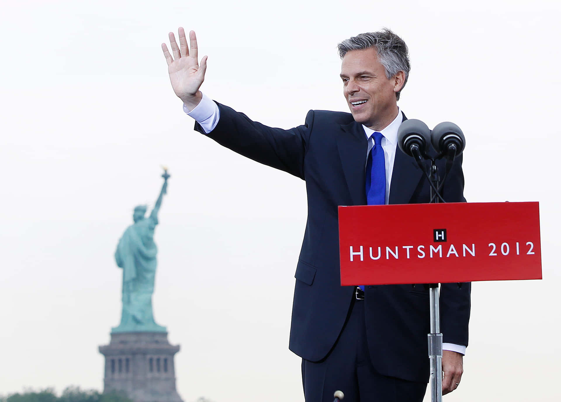 Jon Huntsman Waving Background