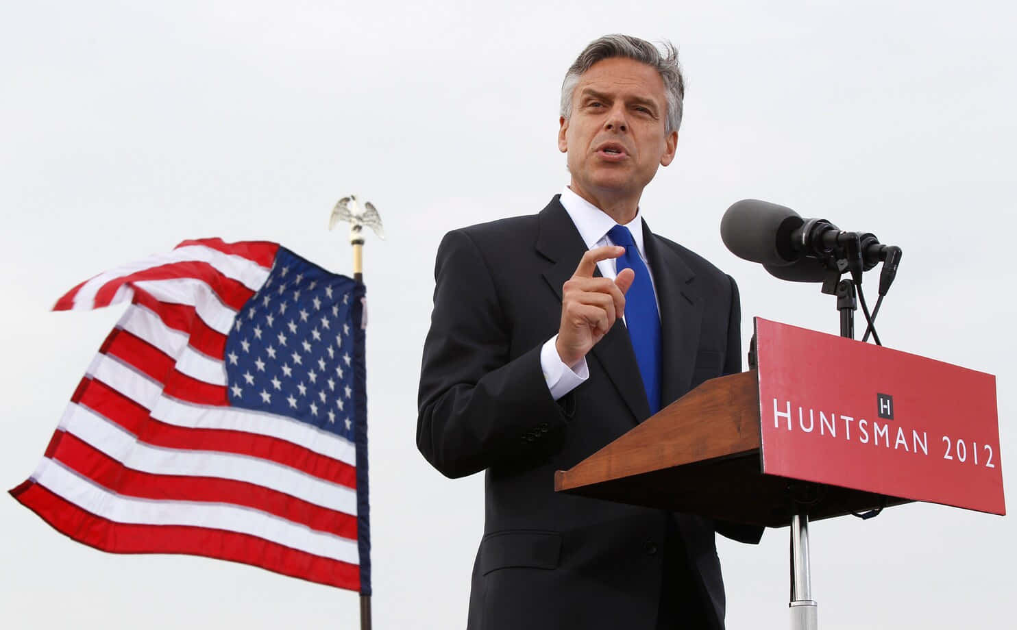 Jon Huntsman With Hand Gesture Background