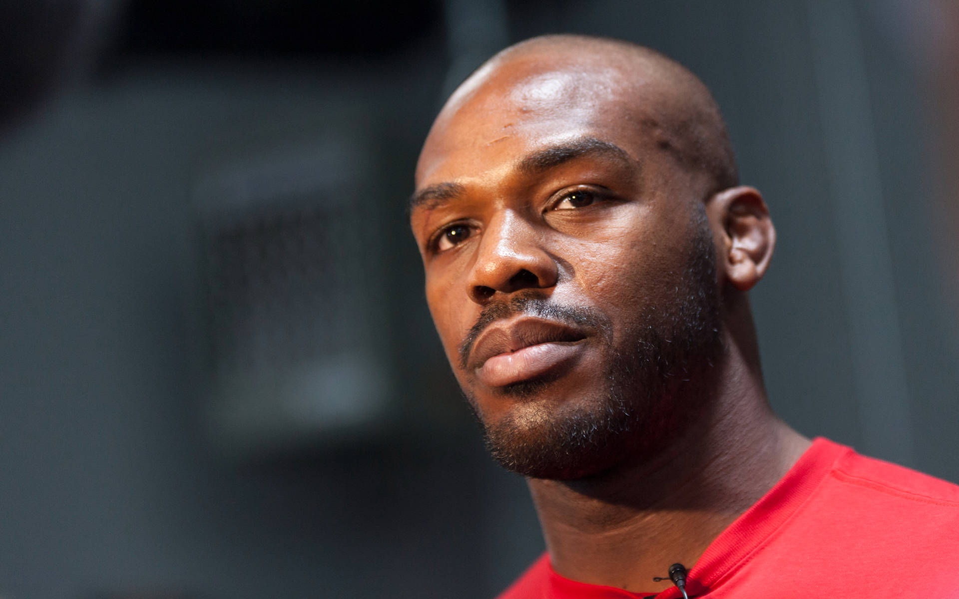 Jon Jones In Red Shirt Background