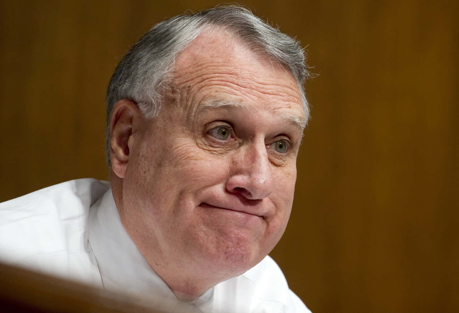 Jon Kyl Forced Smile Background