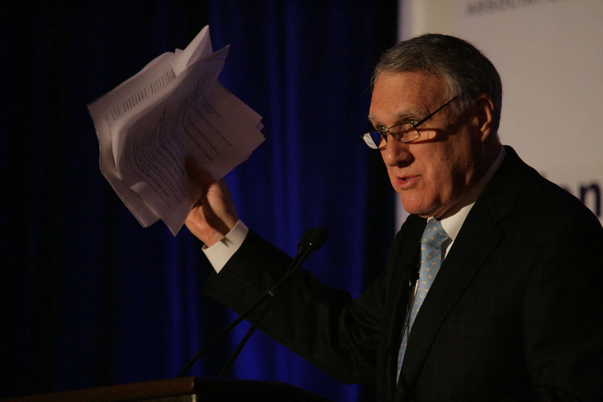 Jon Kyl With Papers Background