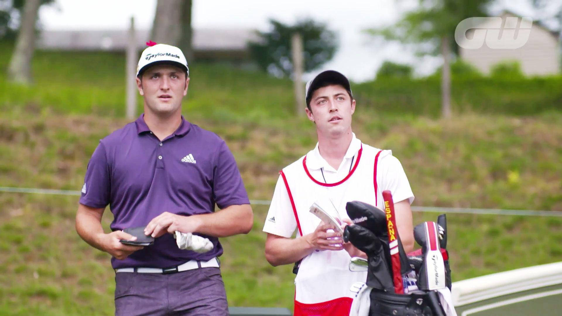 Jon Rahm And A Caddie