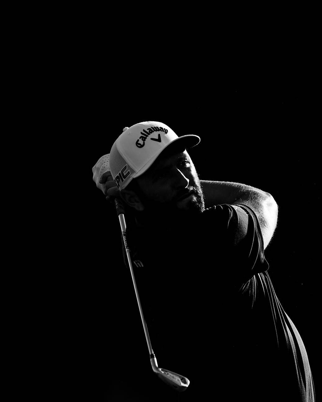 Jon Rahm's Black And White Photo Background