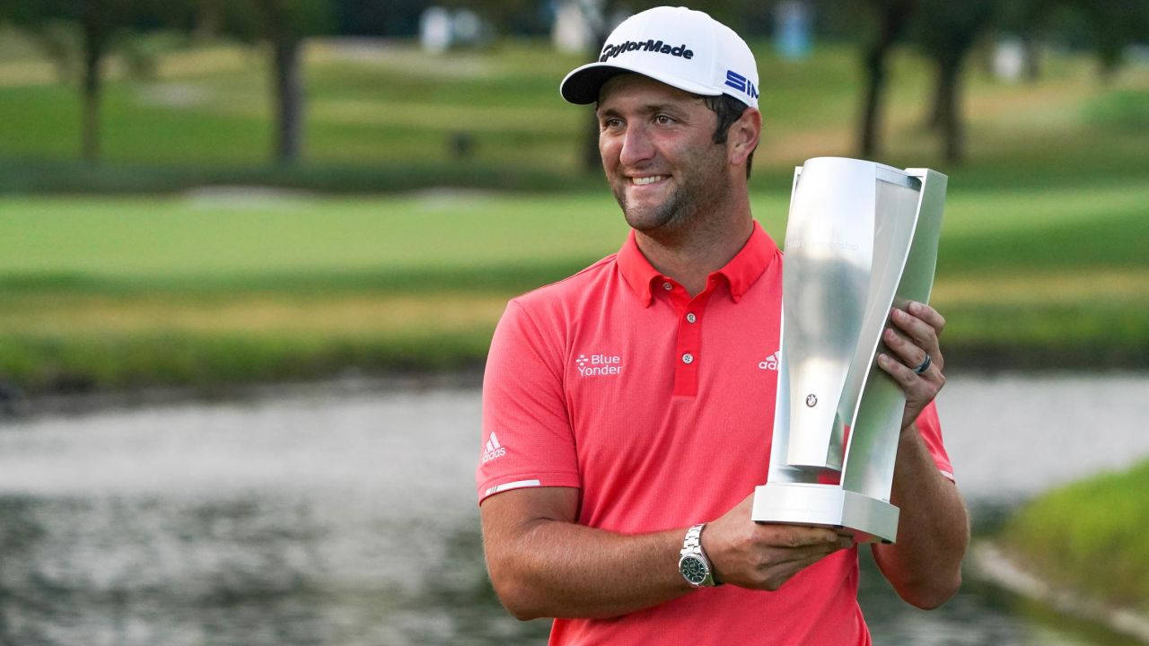 Jon Rahm With His Silber Trophy Background