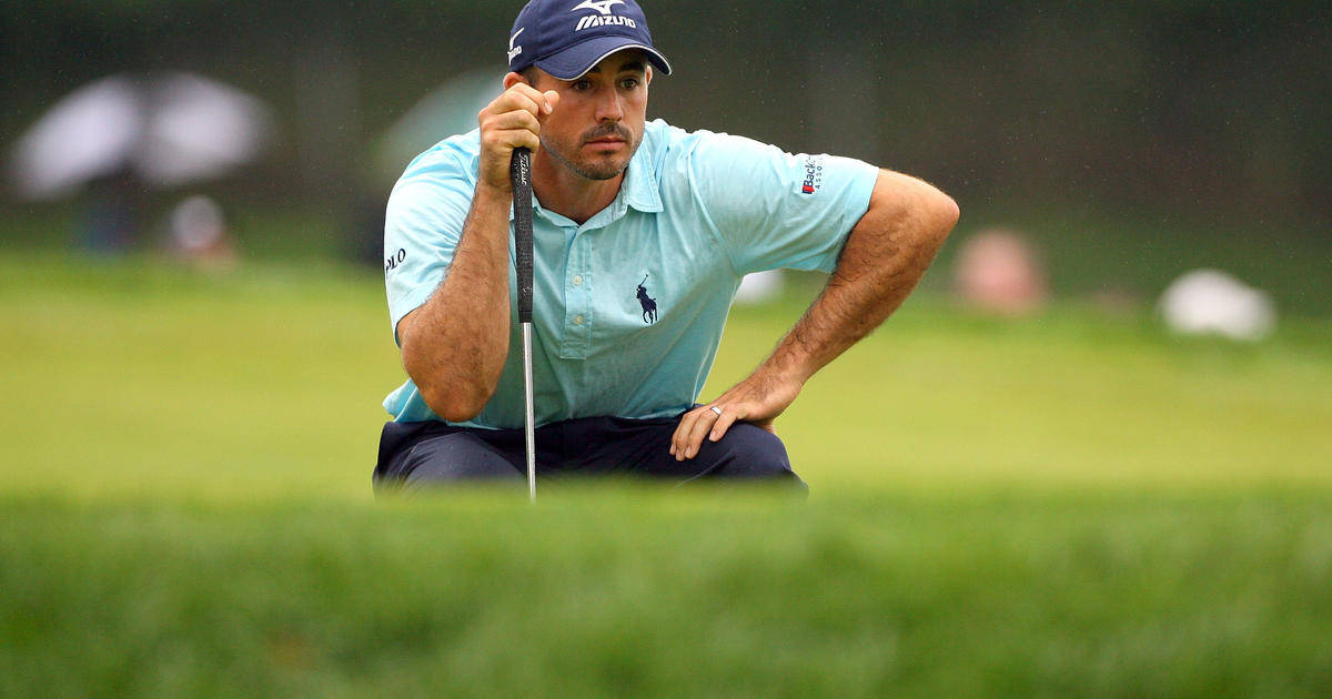 Jonathan Byrd Sitting In Golf Course Background