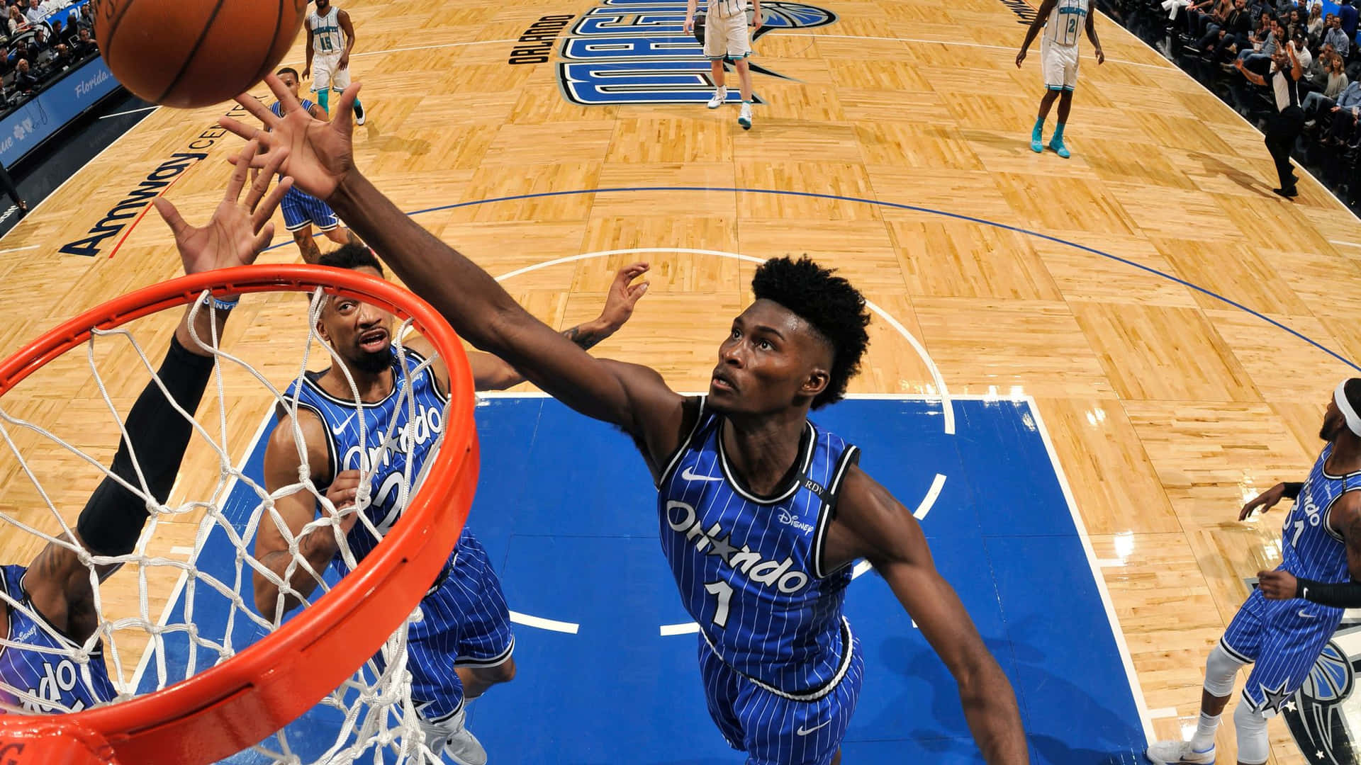 Jonathan Isaac Reaching Ball Background