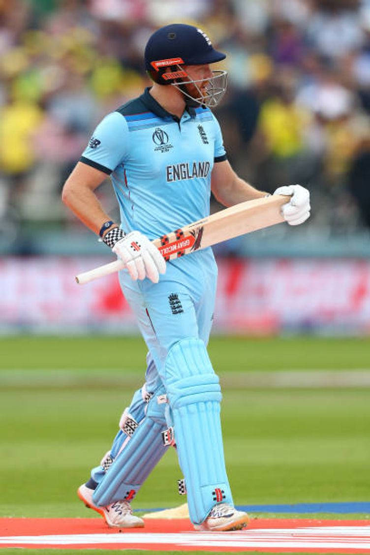 Jonny Bairstow In Action In His Shimmering Sky Blue Uniform Background