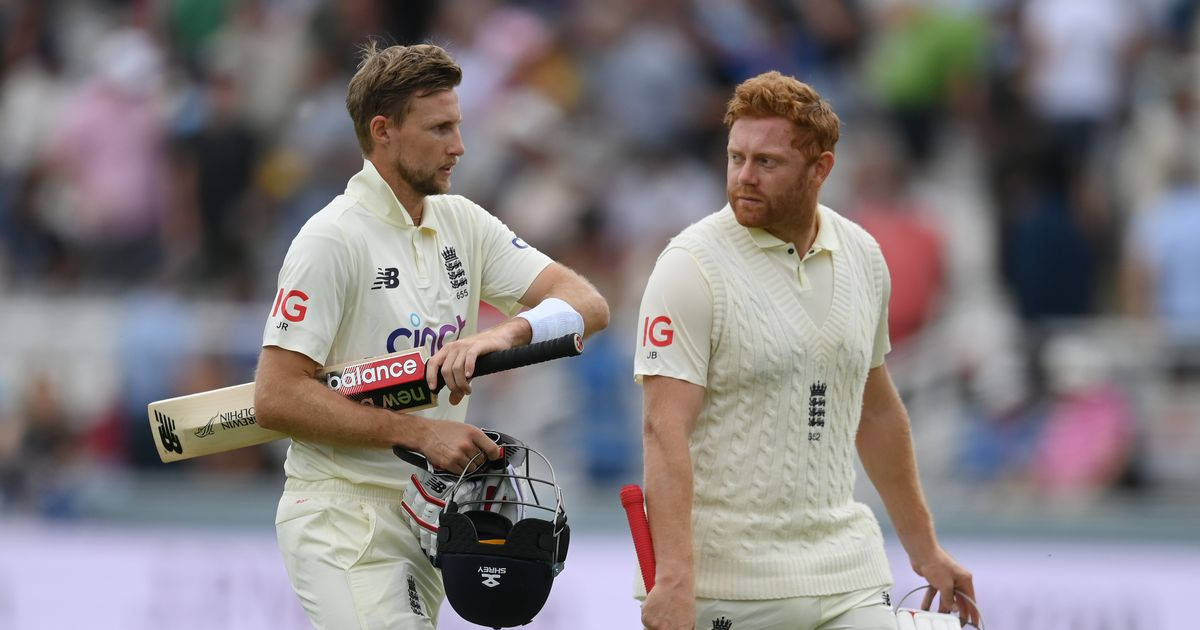 Jonny Bairstow With Cricket Teammate Background