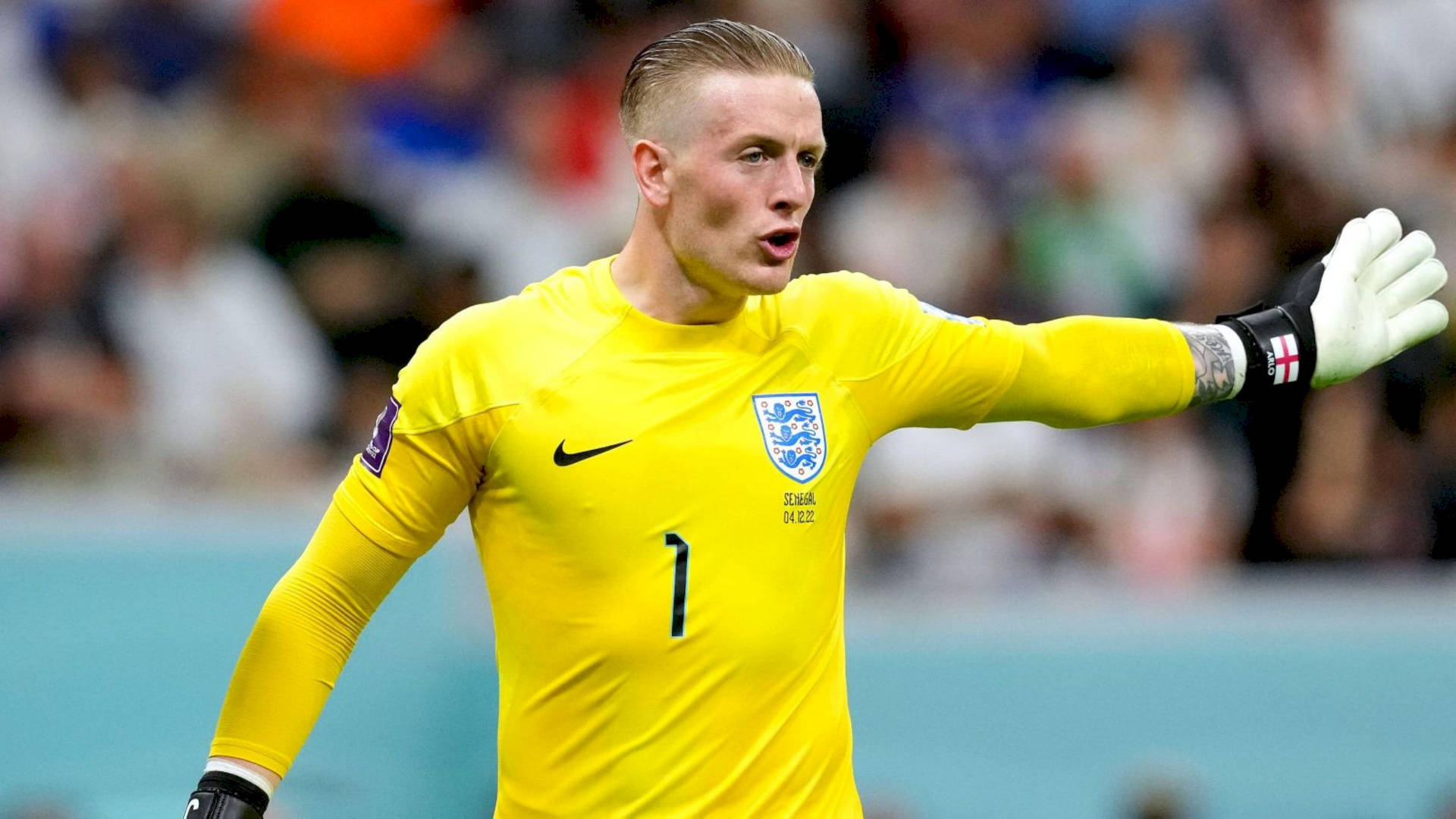 Jordan Pickford Gesturing With His Hand Background