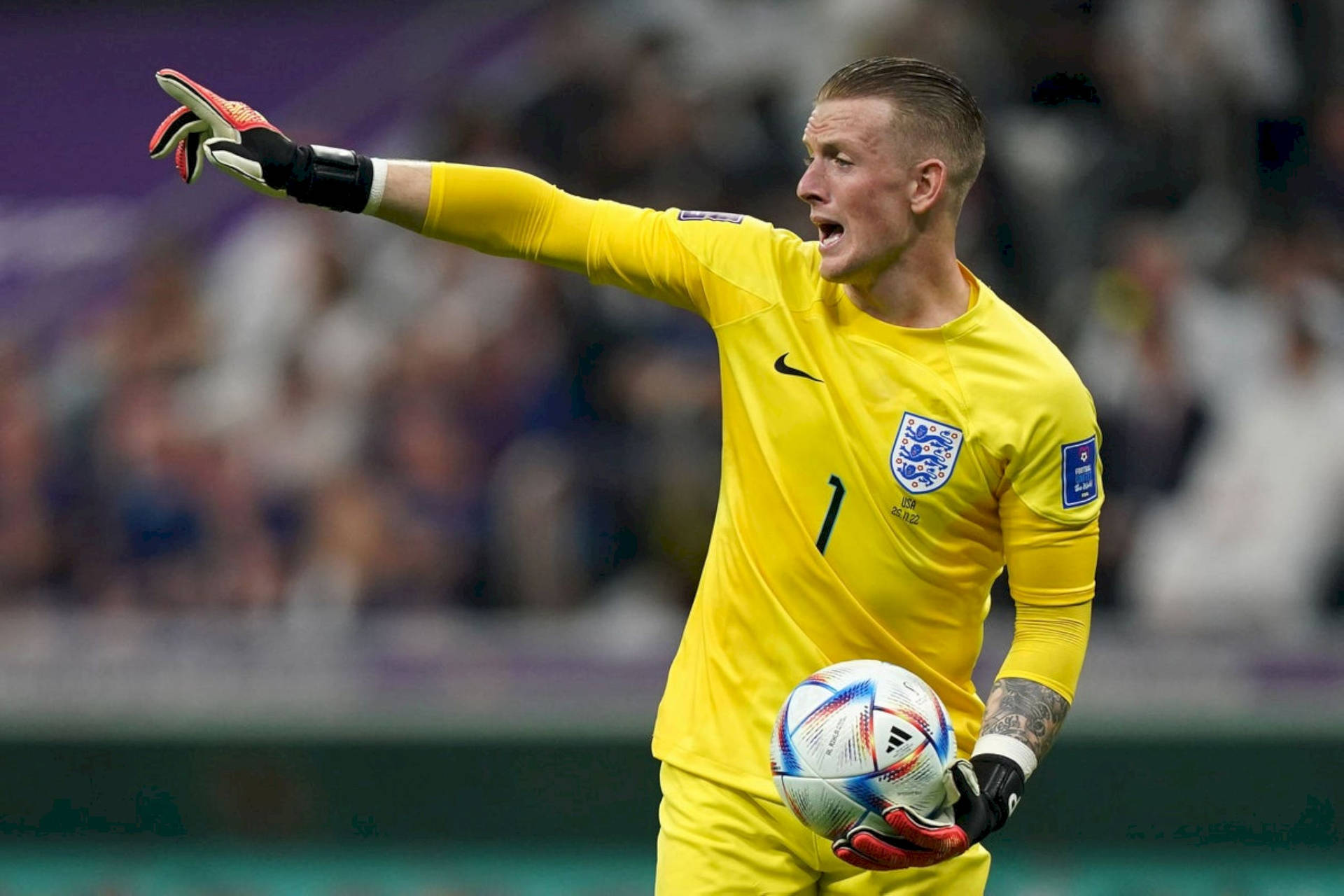 Jordan Pickford Holding Football Background