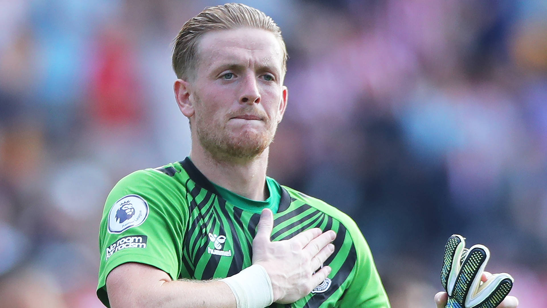 Jordan Pickford With Hand On Chest Background