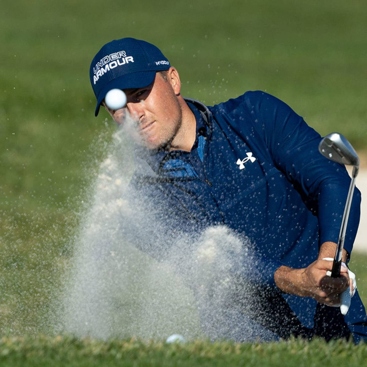 Jordan Spieth Golf Shot In Action Background