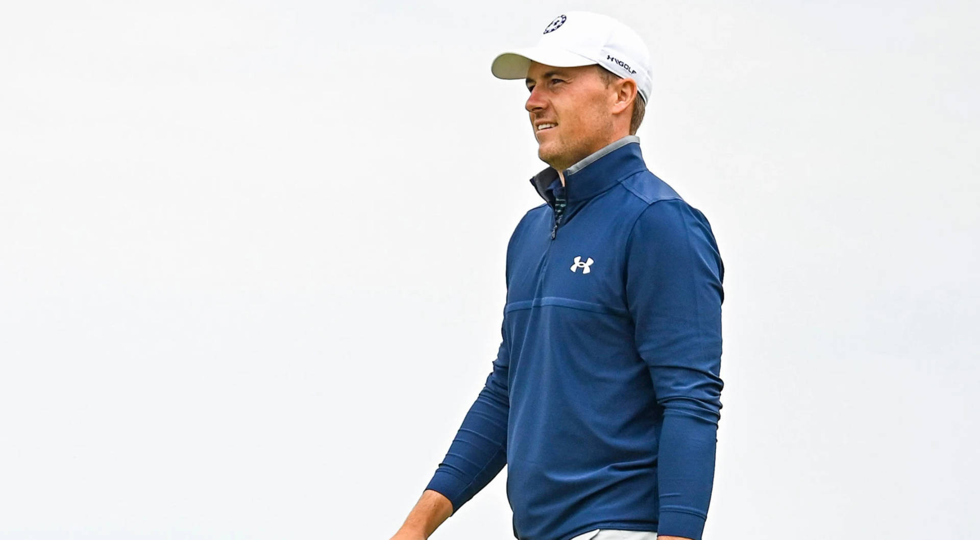 Jordan Spieth In Blue Under Armour Background