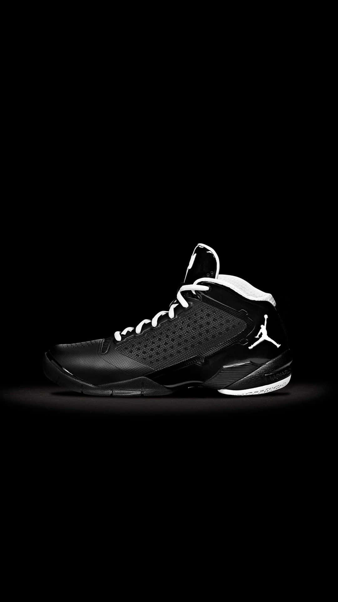 Jordan Xiii - Black And White Basketball Shoe Background