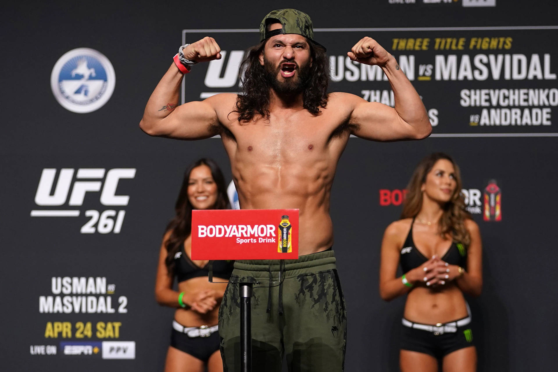 Jorge Masvidal Flexing Weight Background