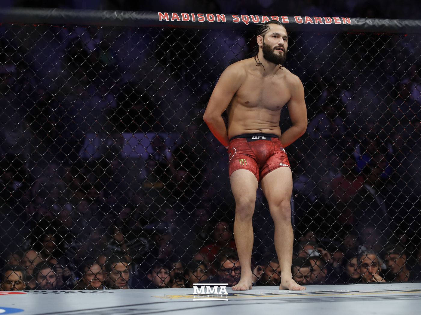 Jorge Masvidal Leaning On Cage