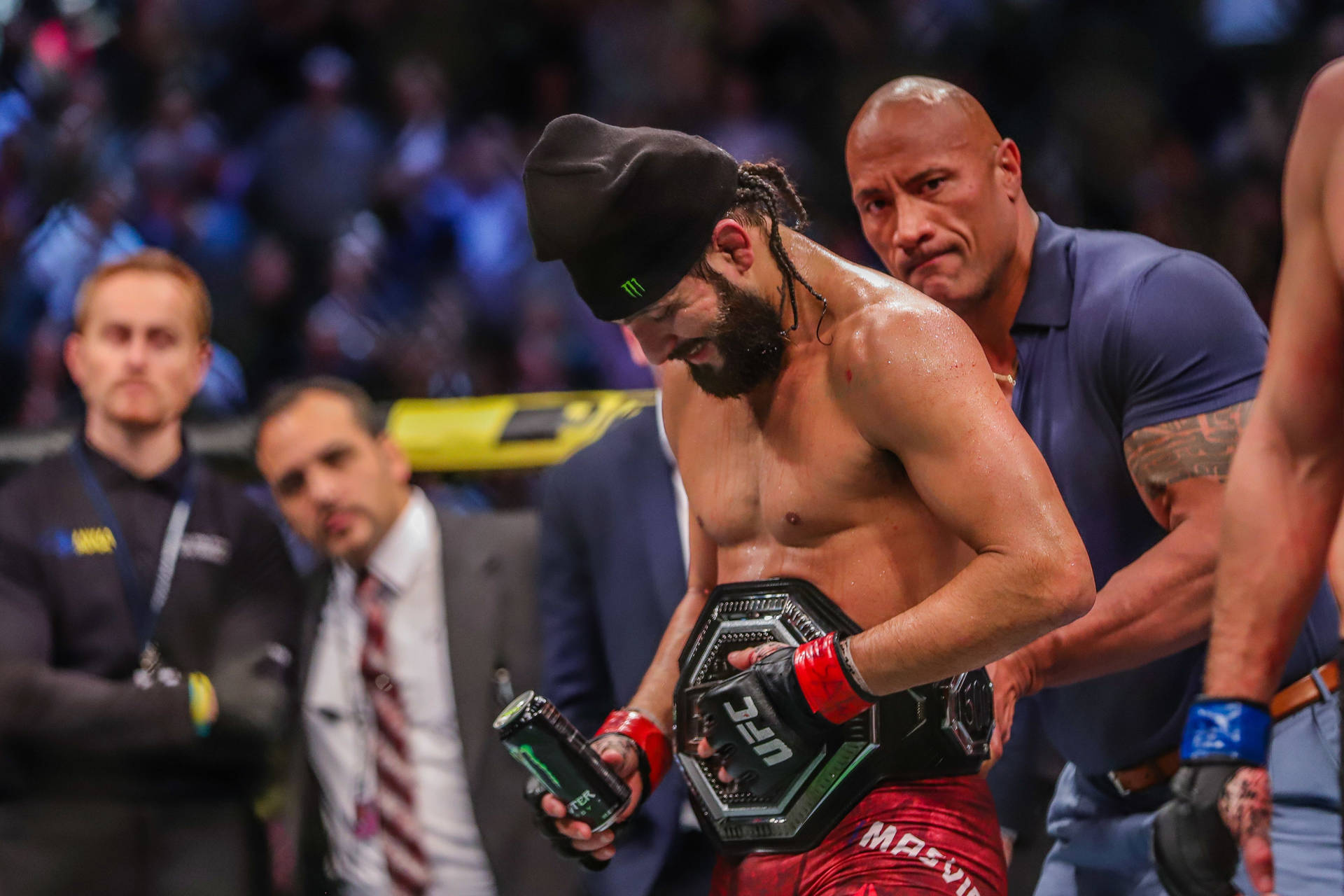 Jorge Masvidal Relaxing With A Monster Energy Drink Background