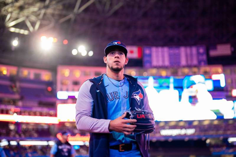 Jose Berrios Carrying Helmet Background