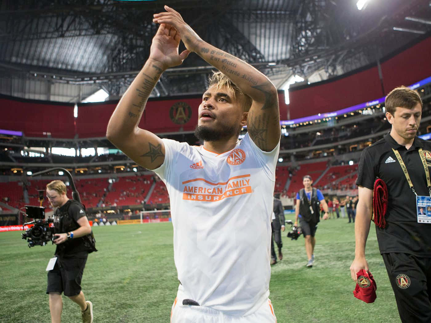 Josef Martinez Celebrating In White Kit Background